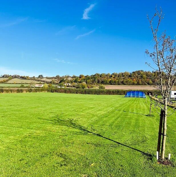The freshly mown camping field ready for arrivals
