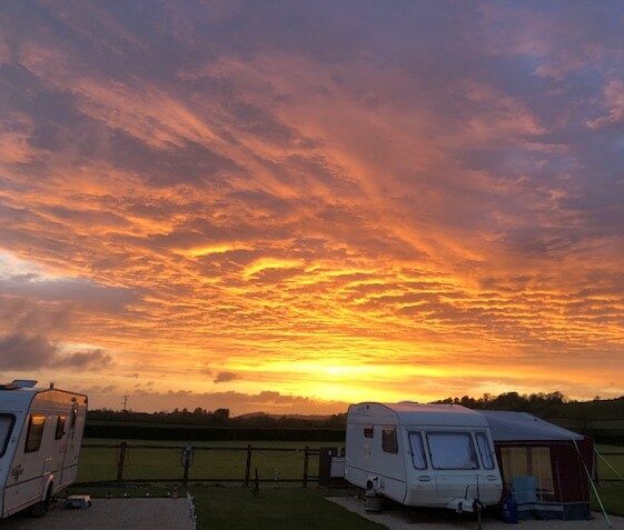 Fiery sunset over the caravans