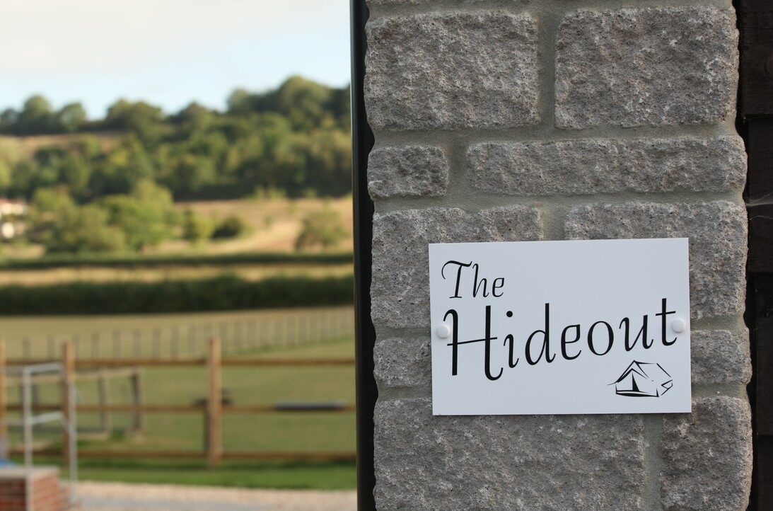 The Hideout entrance sign